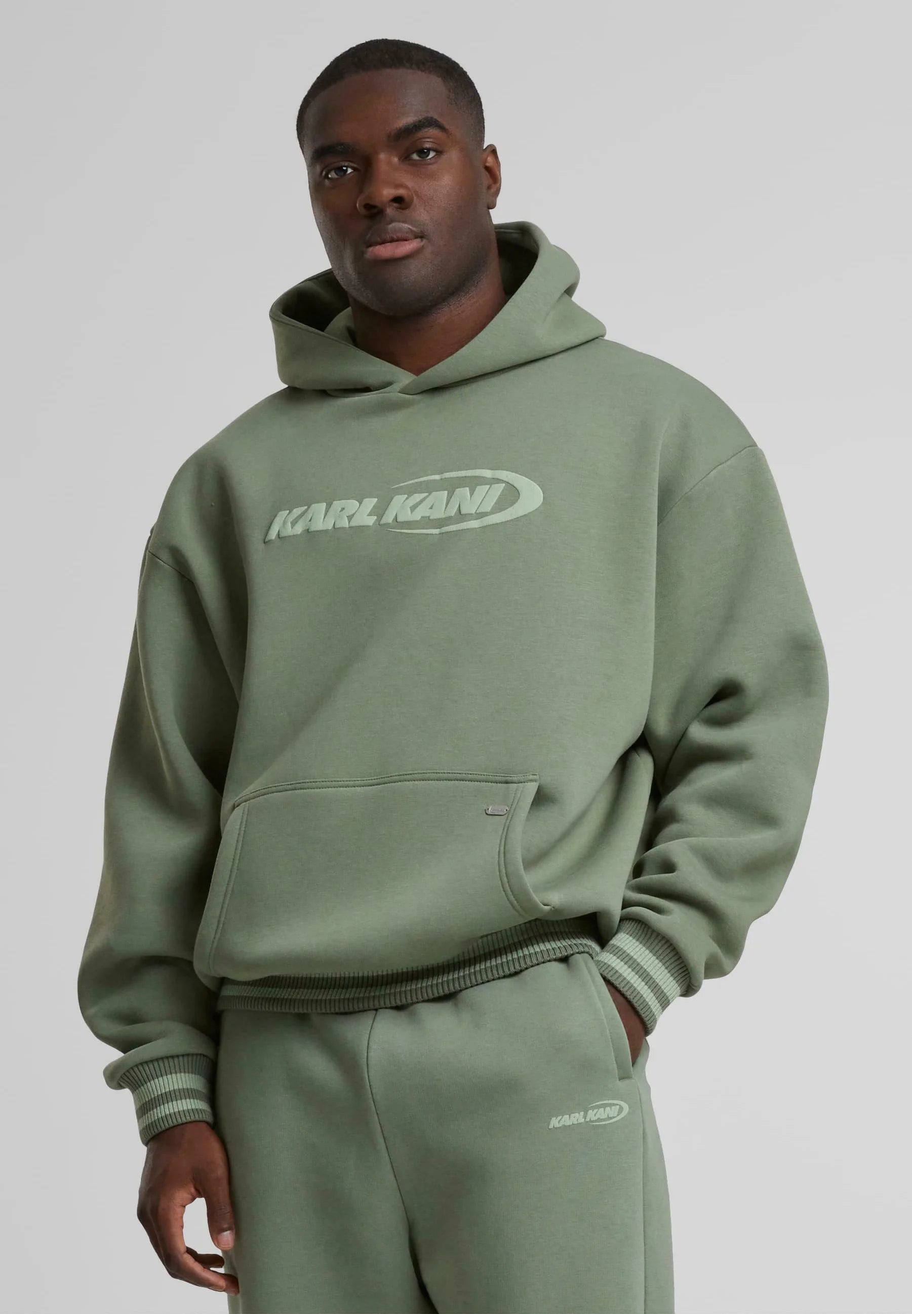 KARL KANI ELLIPSE HOODIE SUDADERA CAPUCHA OVERSIZE FIT OLIVA