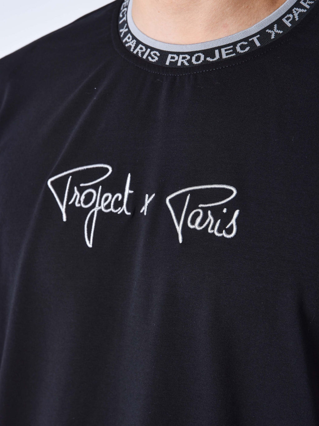 PXP CAMISETA GOMA CUELLO Y MANGAS NEGRA