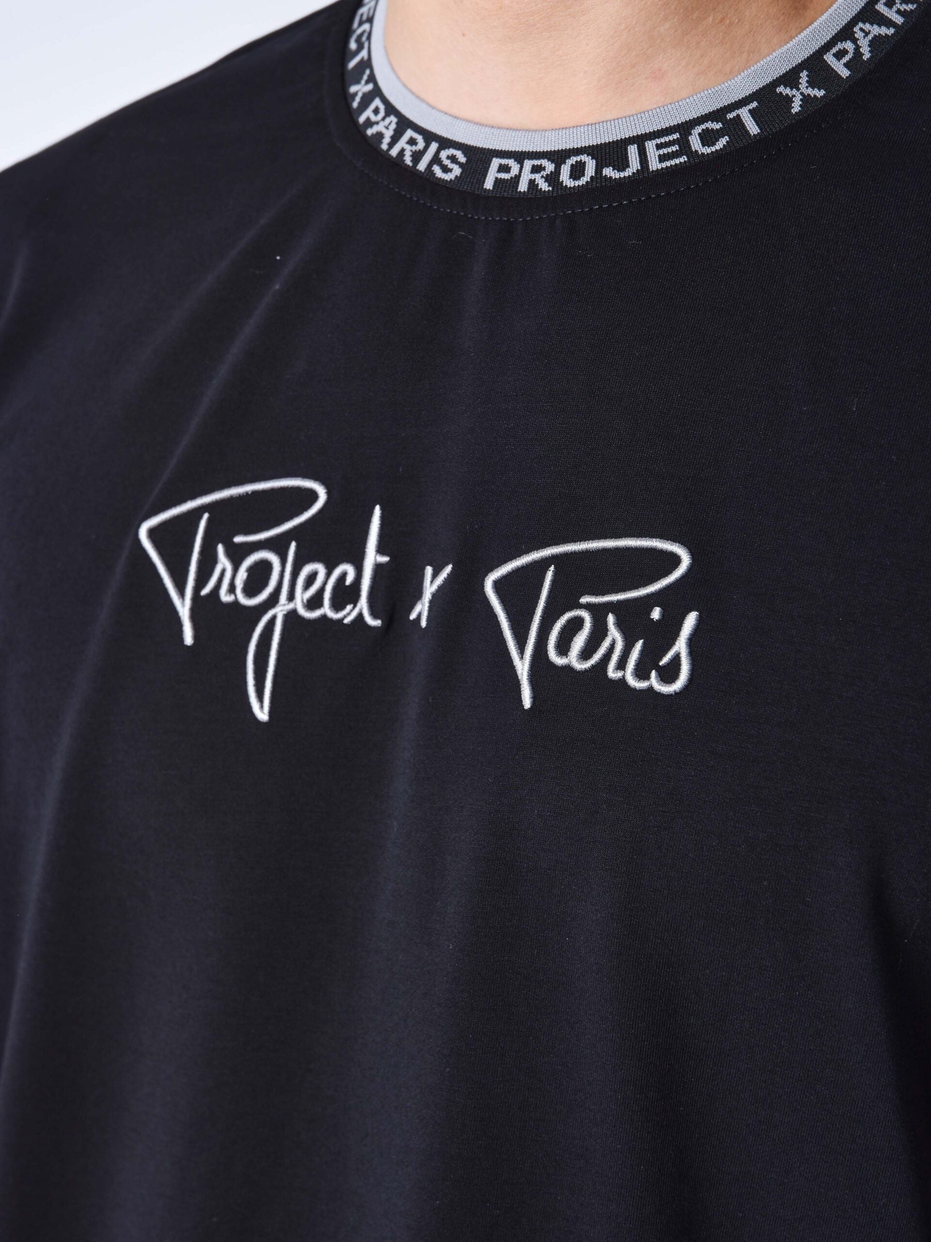 PXP CAMISETA GOMA CUELLO Y MANGAS NEGRA