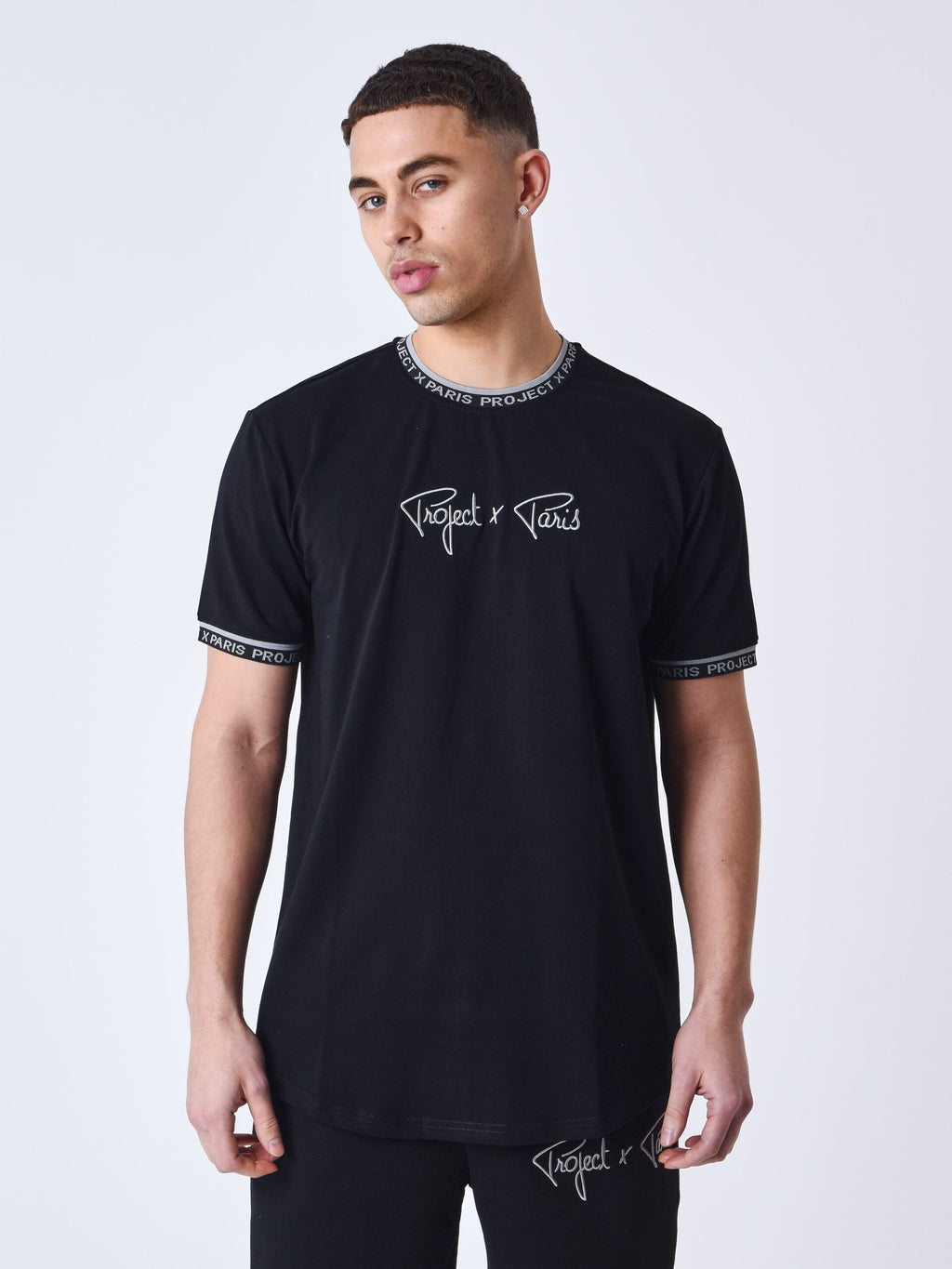 PXP CAMISETA GOMA CUELLO Y MANGAS NEGRA
