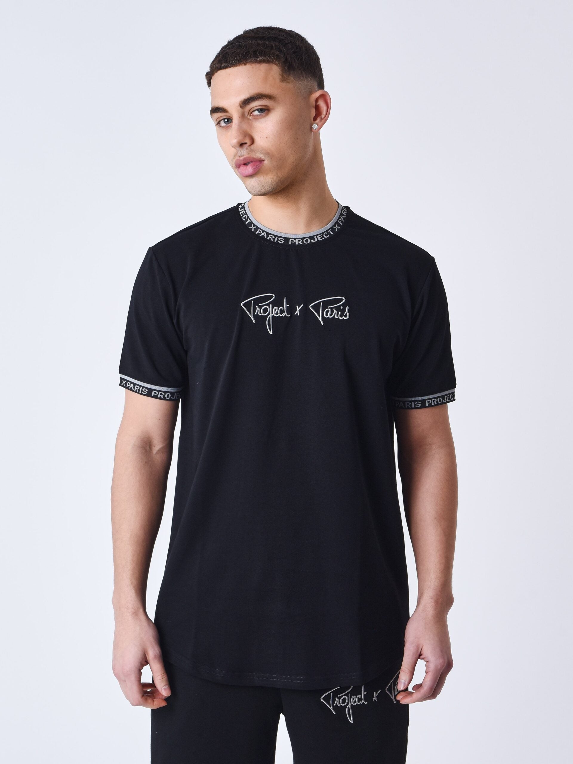 PXP CAMISETA GOMA CUELLO Y MANGAS NEGRA